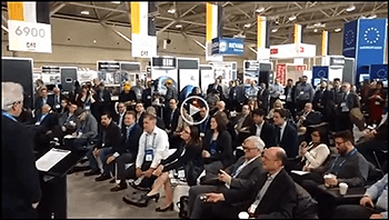 Image of PDAC panel audience and link to video clip